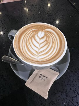 A freshly prepared cup of coffee in a calm setting
